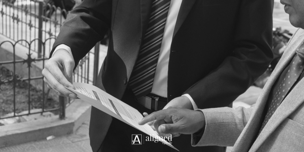 Tax advisor reviewing law firm financial reports to help a small law firm owner plan ahead before tax season